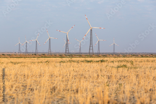 Wind generators in the background in Azerbaijan. Nature ecology concept.