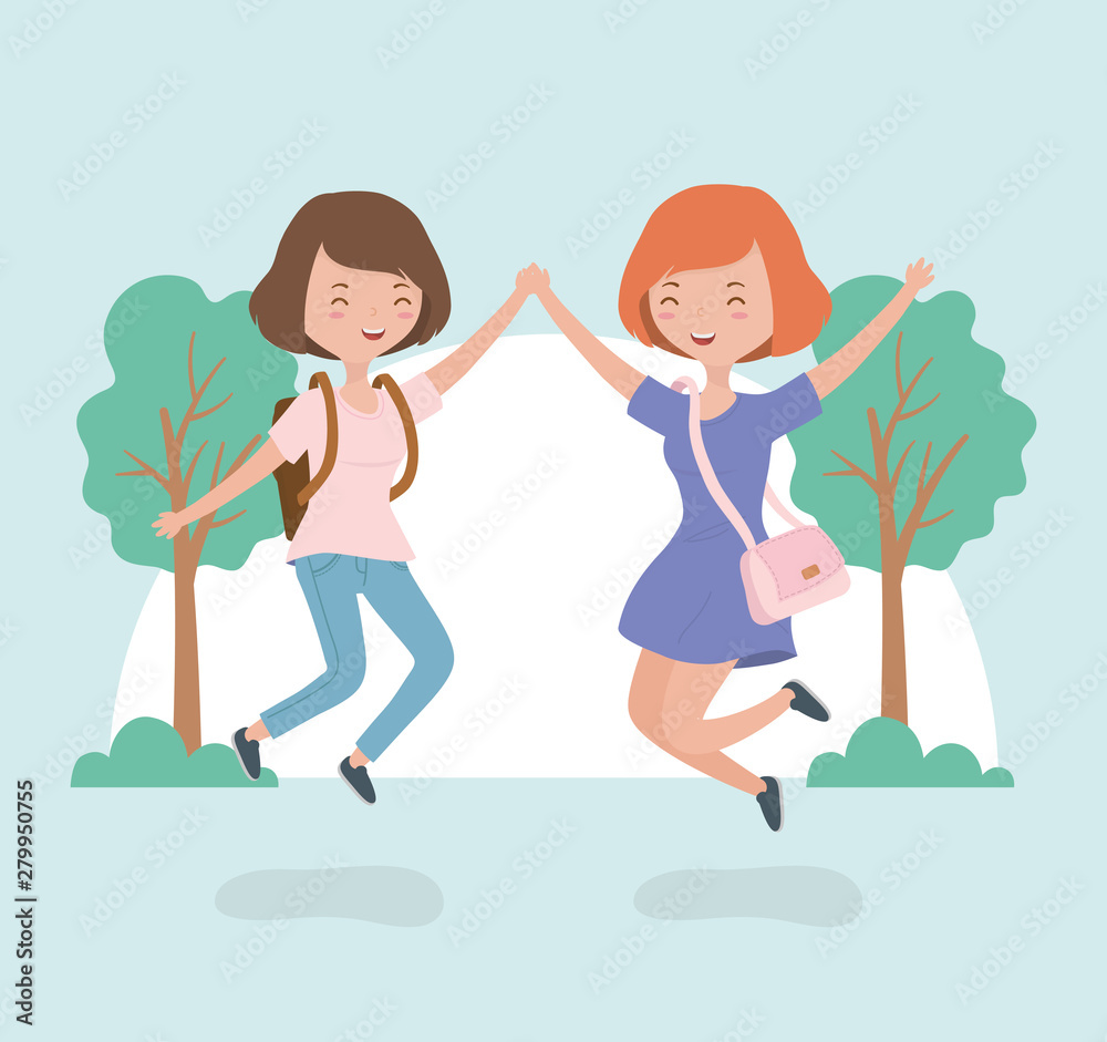 happy young women celebrating jumping in the forest landscape happy young women celebrating jumping in the forest landscape
