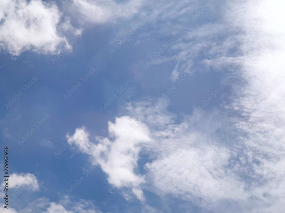 Beautiful nature of blue sky and clouds with the sun shining in the morning, sky background, cloudscape concept, Looking up Beautiful nature of blue sky and clouds with the sun shining in the morning, sky background, cloudscape concept, Looking up