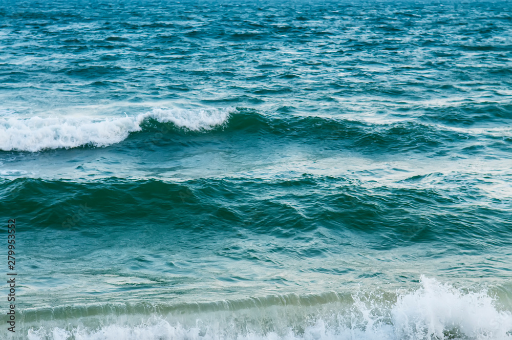 White waves on the beach