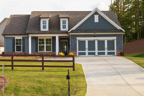 A gray ranch style model house