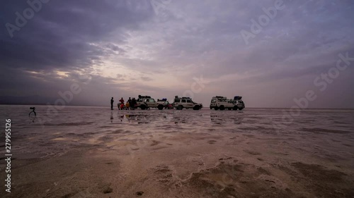 Affar Danakil depression salt mine sunset reflection time lapse. photo