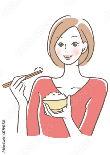 ご飯を食べる女性　白米