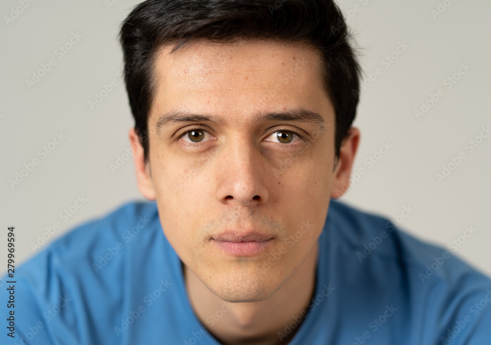 Portrait of young handsome man with happy and smiling face. Beauty concept and lifestyle