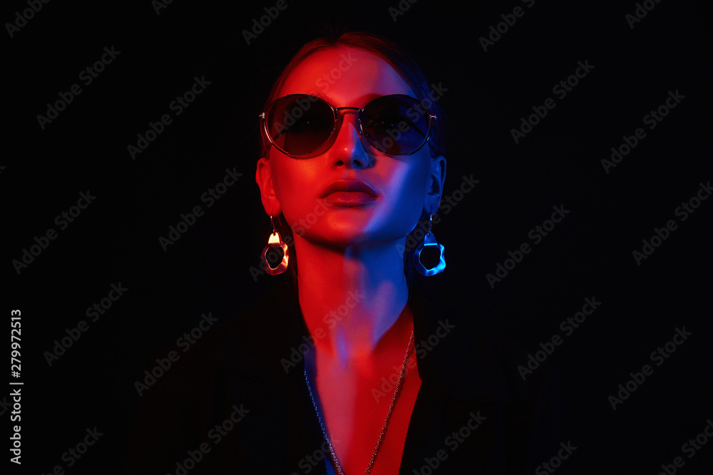 Female silhouette, beautiful woman in color lights Female silhouette, beautiful woman in color lights