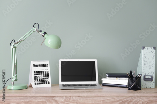 Calendar with laptop and st...