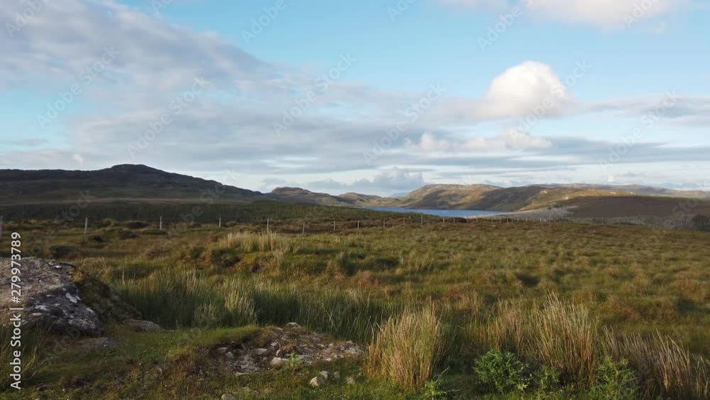 Summer landscape of mountains, hills and meadows by Ardara in County Donegal - Ireland Summer landscape of mountains, hills and meadows by Ardara in County Donegal - Ireland