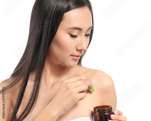 Beautiful Asian woman using...