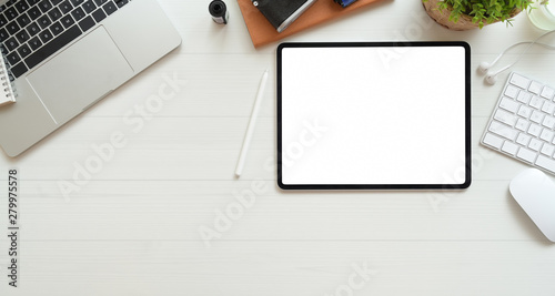 Photographer's workplace with blank screen tablet