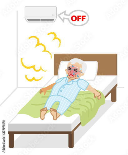 ベッドの上で熱中症に苦しむシニア男性 -エアコンオフの室内