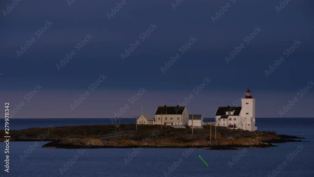 Time lapse shot, of the Homborsund Lighthouse, on the Store Gronningen island, on a sunny, summer evening, in Grimstad, Aust-agder, Norway Time lapse shot, of the Homborsund Lighthouse, on the Store Gronningen island, on a sunny, summer evening, in Grimstad, Aust-agder, Norway