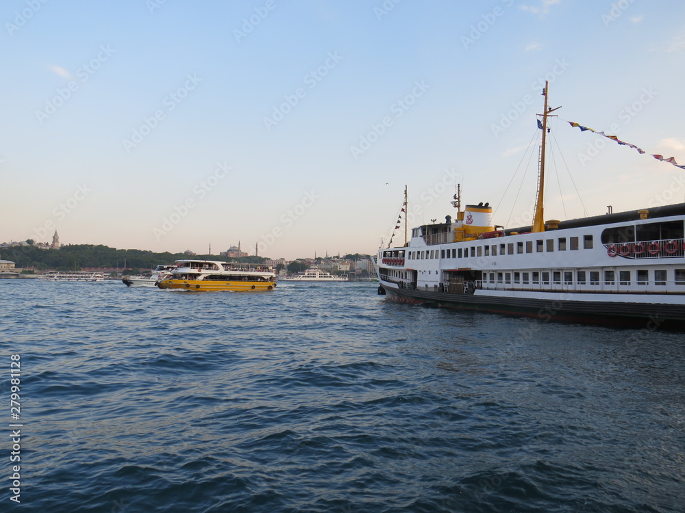 A ferry and a taxi boat in the Bosporus Strait in Istanbul, Turkey