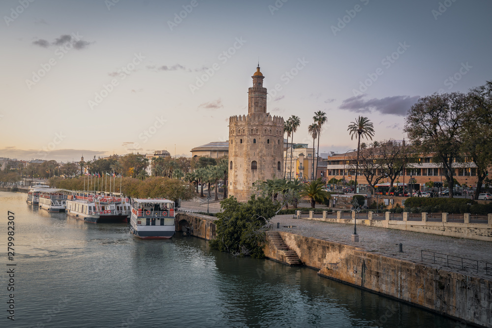 Torre del Oro tower and Guadalquivir River at sunset - Seville, Andalusia, Spain