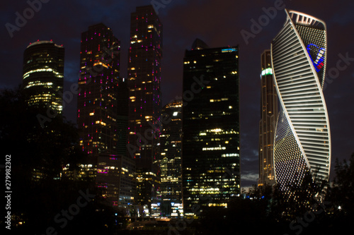 Night view of the modern architectural complex of Moscow city with multicolored illumination Russia