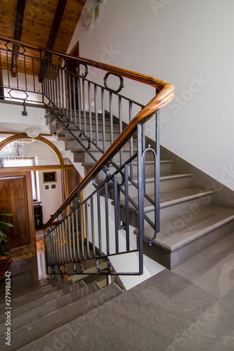 stone staircase and wooden railing