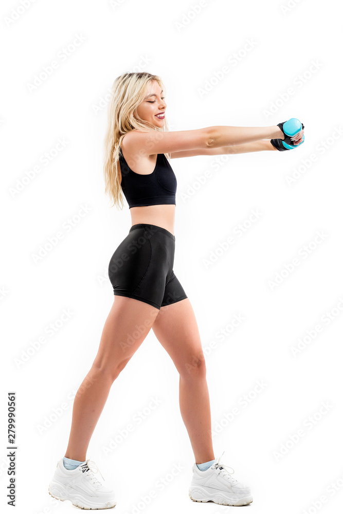 Beautiful fit woman exercising with dumbbells Beautiful fit woman exercising with dumbbells