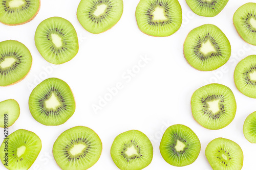Sliced kiwi with empty circle copy space isolated on white background