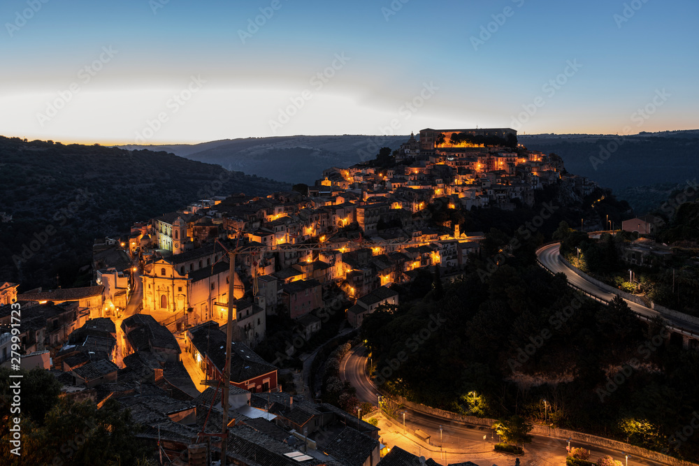 City view of the old baroque town of Ragusa Ibla at night, Sicily, Italy