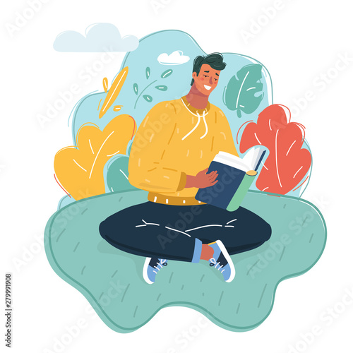 Man reading book on grass.