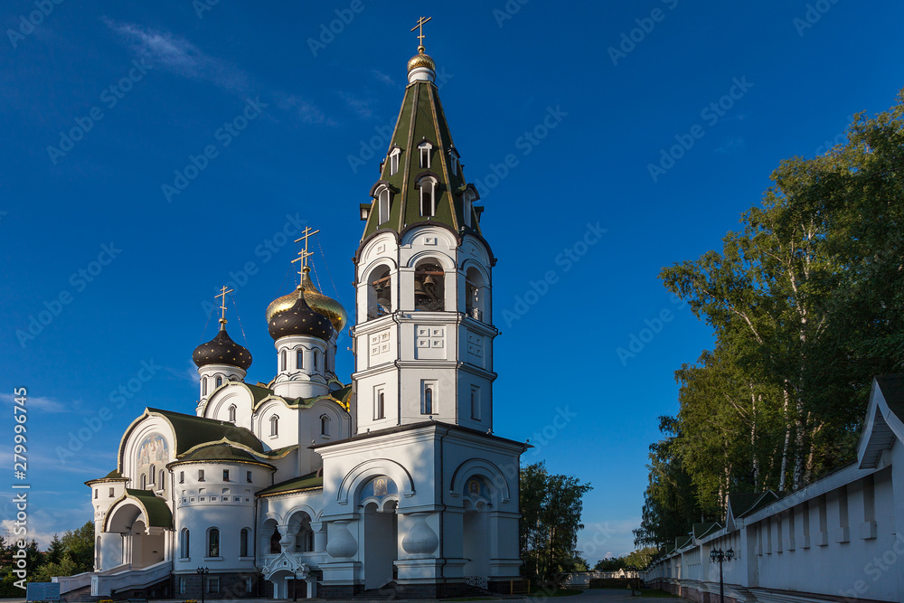 Russian Orthodox white-stone church with green domes