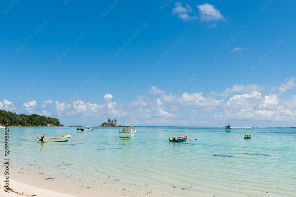 Many small boats near indian ocean coastline Many small boats near indian ocean coastline