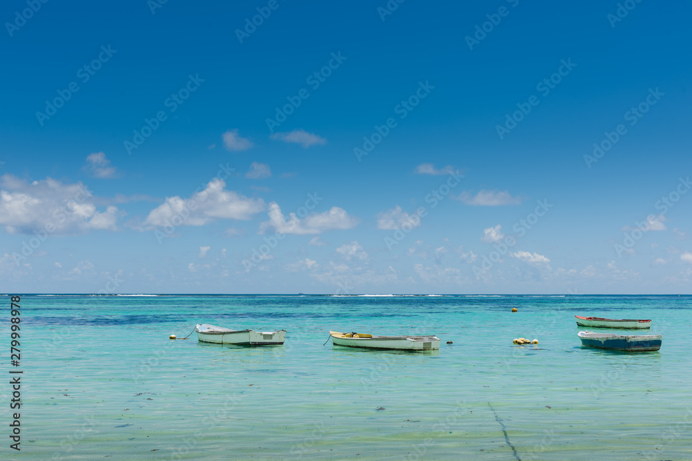 Many small boats near indian ocean coastline Many small boats near indian ocean coastline