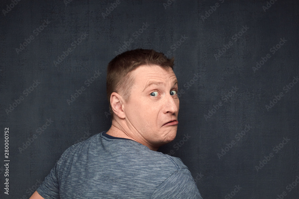 Portrait of frightened man caught off guard