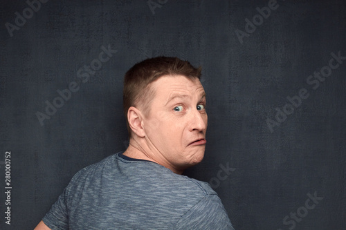 Portrait of frightened man caught off guard