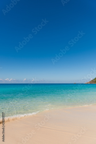 Tropical beach with white sand turquoise water