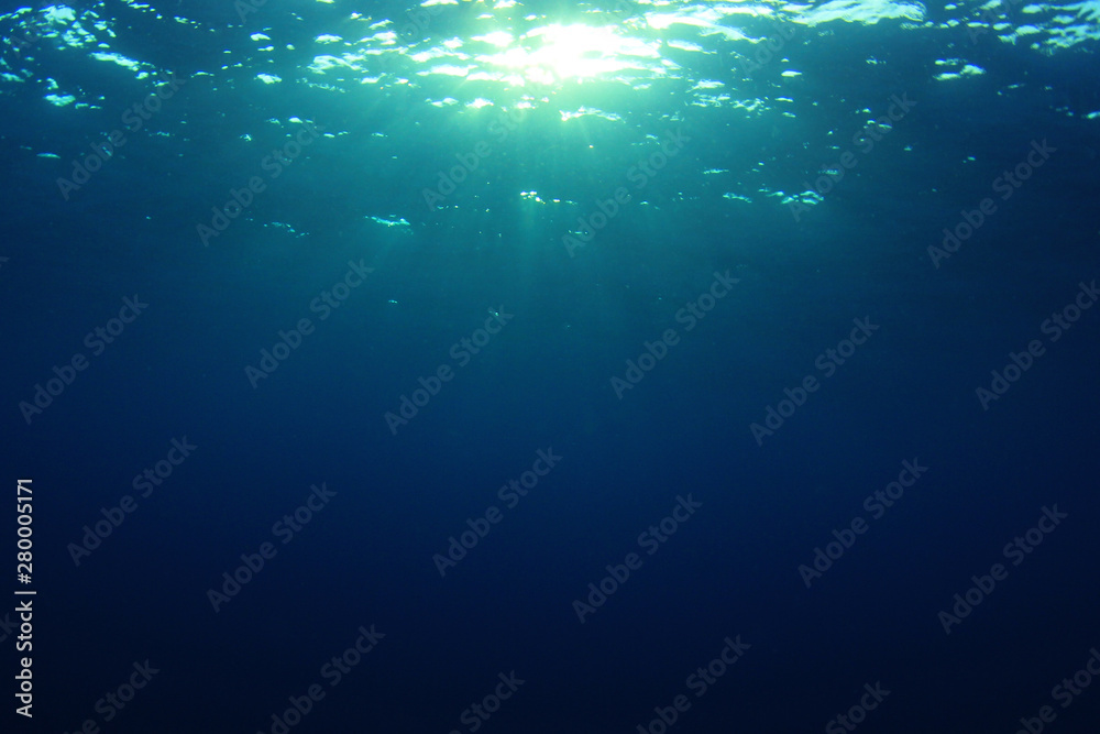 Sunburst on ocean surface Sunburst on ocean surface