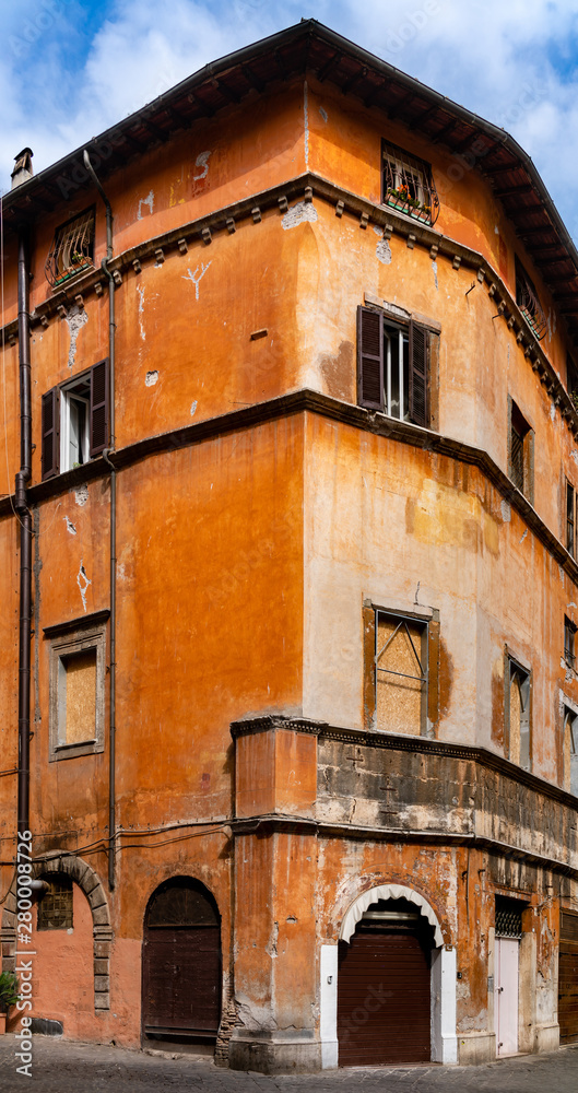 Old building facade at Jewish Ghetto quarter in  Rome.