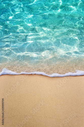 Fototapeta Naklejka Na Ścianę i Meble -  Soft blue ocean wave or clear sea on clean sandy beach summer concept