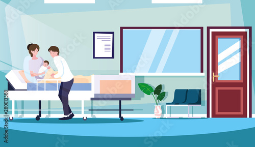parents with newborn in stretcher hospitalization room