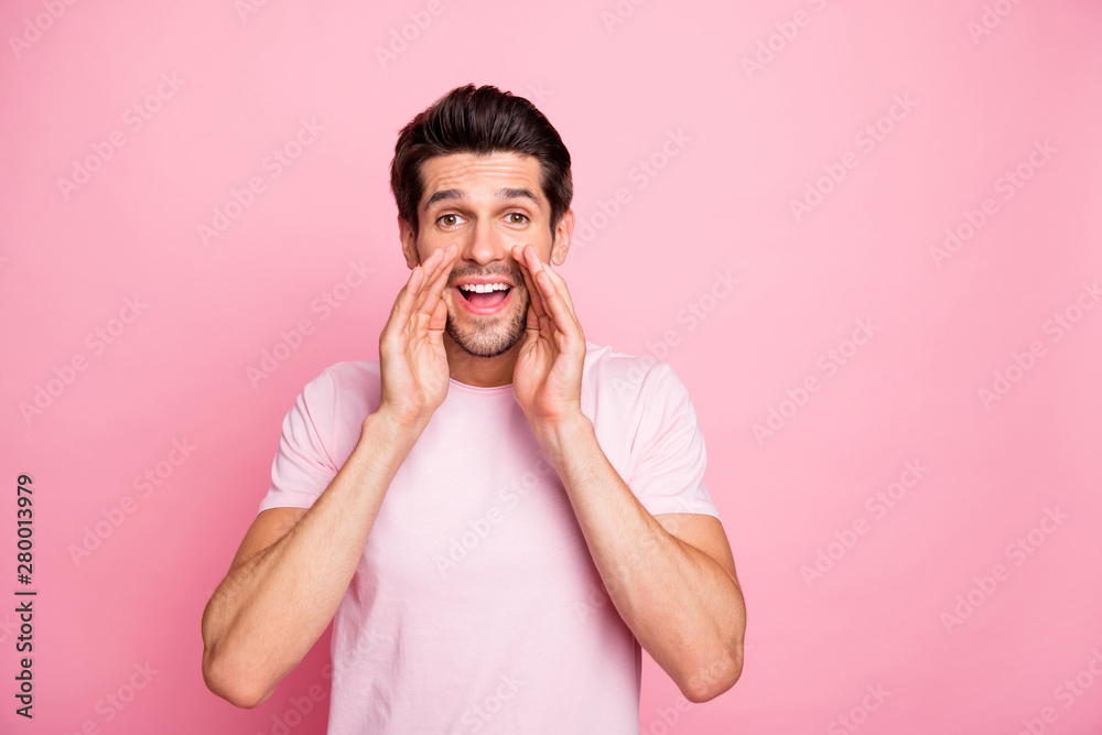 Close-up portrait of his he nice attractive lovely cheerful cheery guy saying private message promoter ad isolated over pink pastel background Close-up portrait of his he nice attractive lovely cheerful cheery guy saying private message promoter ad isolated over pink pastel background