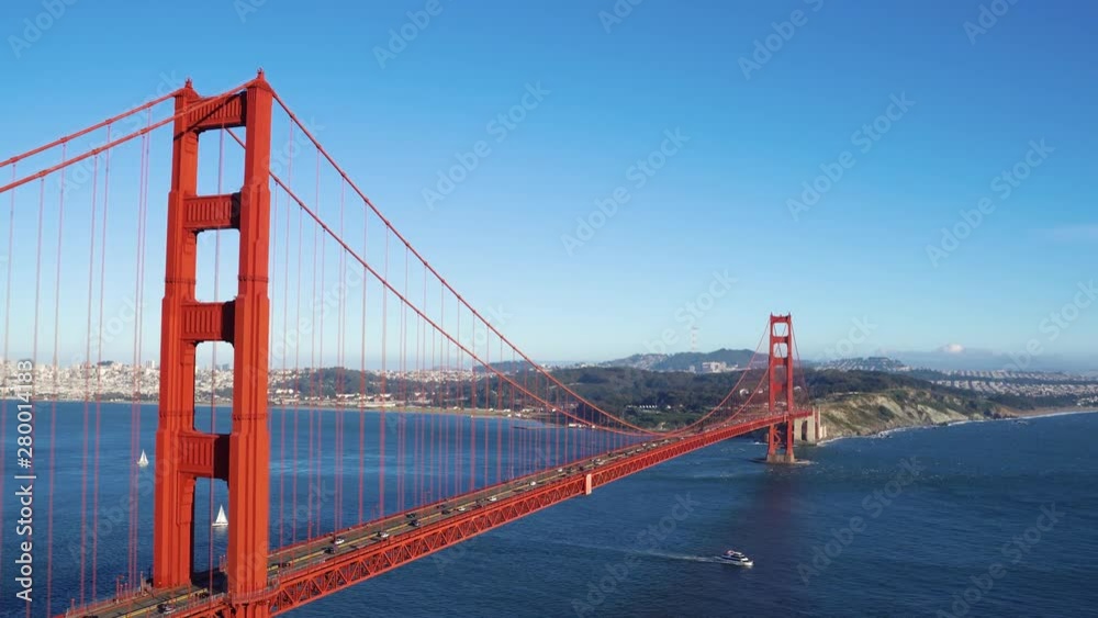 Golden Gate Bridge aerial view San Francisco California State. beautiful amazing nature mountain by busy city urban area on summer. blue sky and clear ocean sea water with red iron bridge traffic. Golden Gate Bridge aerial view San Francisco California State. beautiful amazing nature mountain by busy city urban area on summer. blue sky and clear ocean sea water with red iron bridge traffic.