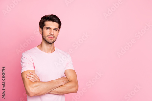 Portrait of his he nice attractive lovely sportive brutal focused calm content guy folded arms isolated over pink pastel background © deagreez