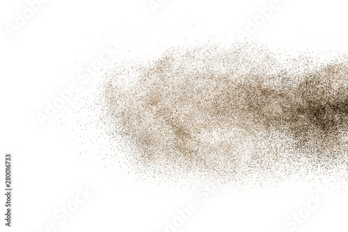 Brown powder explosion isolated on white background.