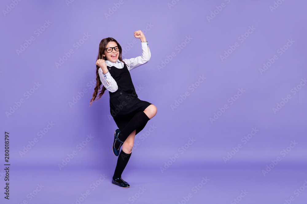 Full length body size view of nice attractive cheerful cheery glad confident successful wavy-haired pre-teen girl rejoicing having fun great news isolated over bright vivid shine violet background Full length body size view of nice attractive cheerful cheery glad confident successful wavy-haired pre-teen girl rejoicing having fun great news isolated over bright vivid shine violet background