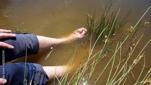 natural leech therapy, people doing leech therapy in the lake, photo