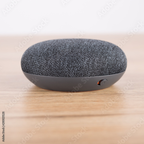 digital voice assistant with wood background