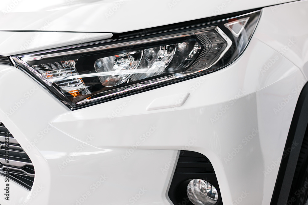 Modern and luxury car headlights. Exterior detail