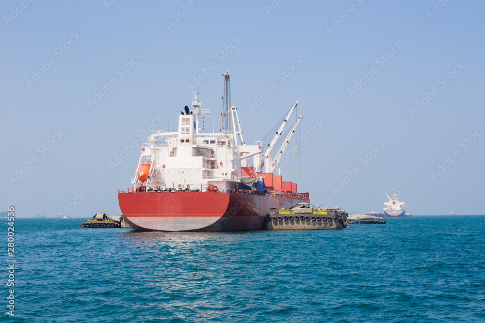 International cargo ship in the ocean, Freight transportation, Shipping, Nautical Vessel.