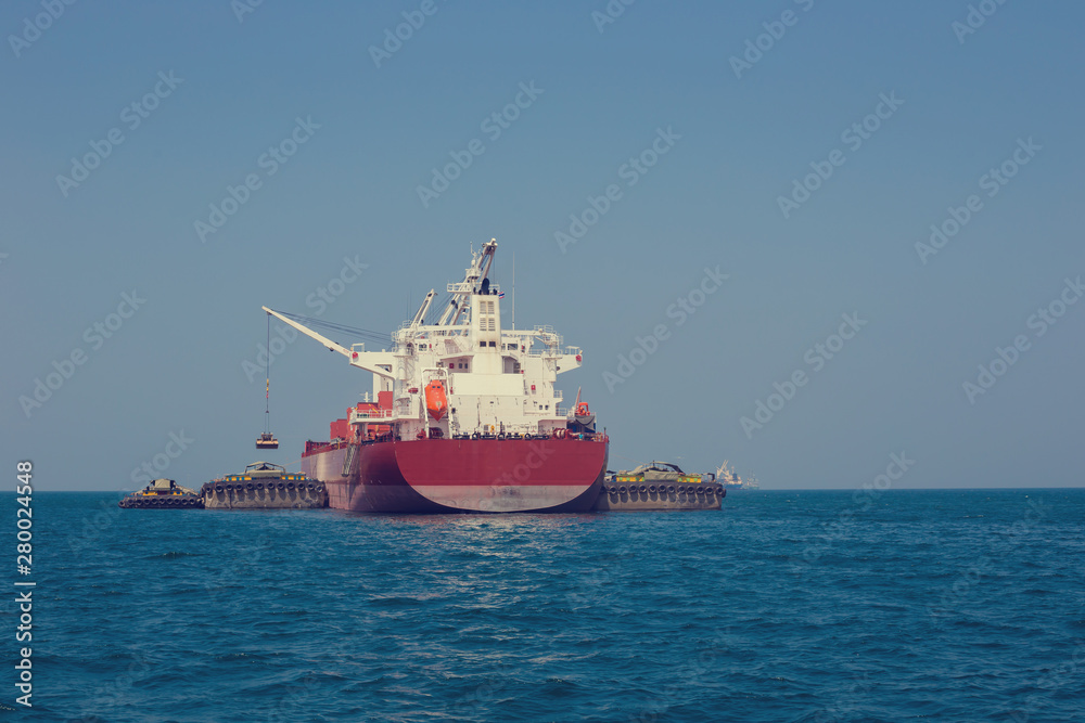 International cargo ship in the ocean, Freight transportation, Shipping, Nautical Vessel.