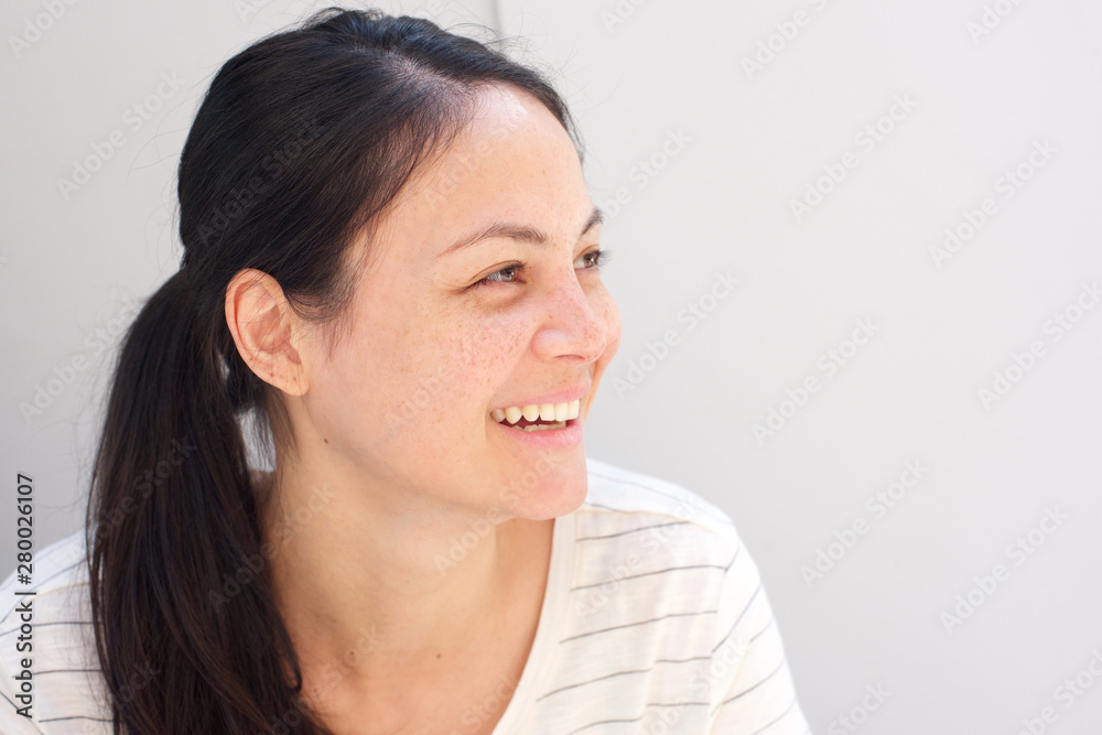 horizontal portrait of beautiful young asian woman smiling and looking away horizontal portrait of beautiful young asian woman smiling and looking away