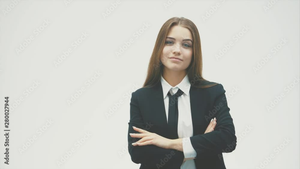 Portrait of a confident young woman standing isolated on white background Portrait of a confident young woman standing isolated on white background