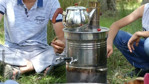 drinking tea, making tea with a samovar, enjoying a turkish samovar tea,