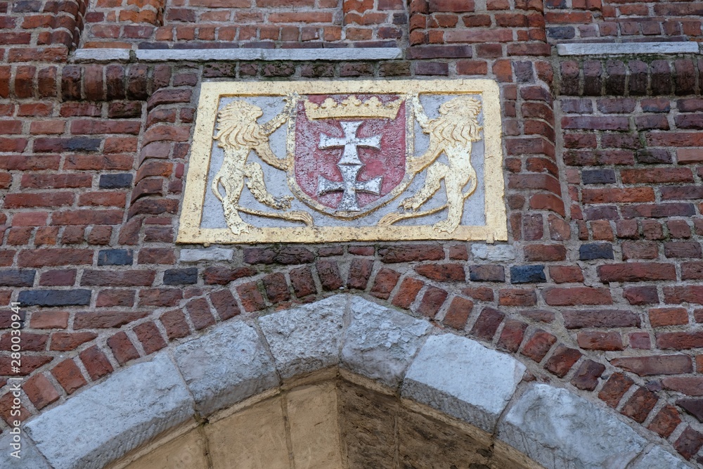 Gdansk, Old Town, Poland - coat of arms of Gdansk over the Mariacki Gate