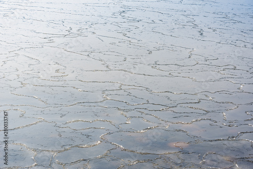 Floating ice on Baltic sea surface.
