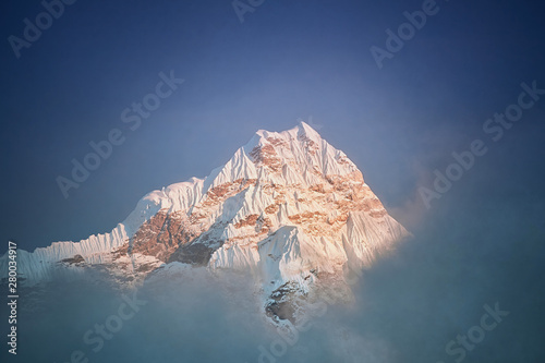 View of Mount Amphu Gyabjen in Himalaya mountains at sunset. Khumbu valley, Everest region, Nepal photo