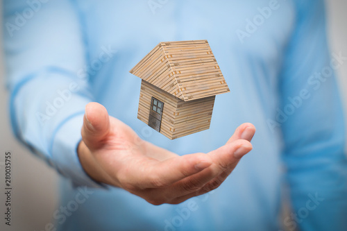 hand holding home, house, property, realestate